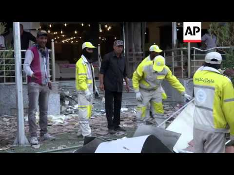 Rescaldo do carro-bomba que matou 14 e feriu 23
