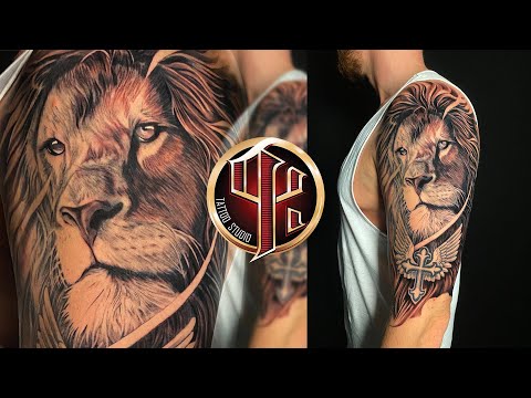 Löwe und Kreuz mit Flügeln Tattoo By Tattoo Studio Pattos Keppos