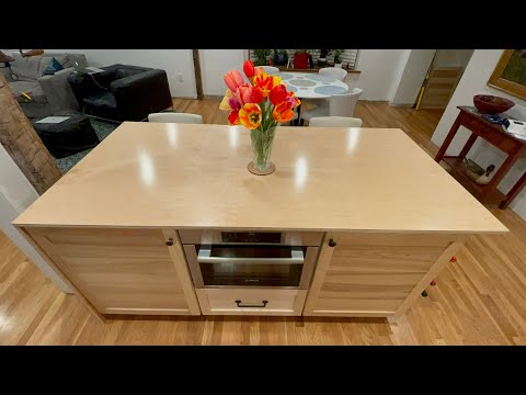 Part of a video titled IKEA Hack Custom Kitchen #15: Anchoring the Island to the Floor