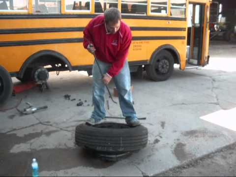 Changing a school bus tire