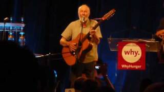 Pete Seeger changes the words to "Over the Rainbow"