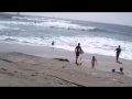 Arik and surfing buddies being real at the beach