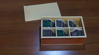 CAJA DE MADERA CON TAPA CORREDIZA Y DIVISIONES / Juan Carlos Aquila