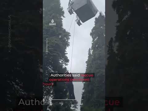 Nearly 300 tourists rescued after cable cars halt mid-air