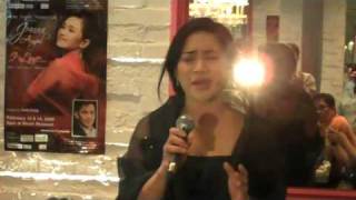 Joanna Ampil sings a snippet of the song "Home"