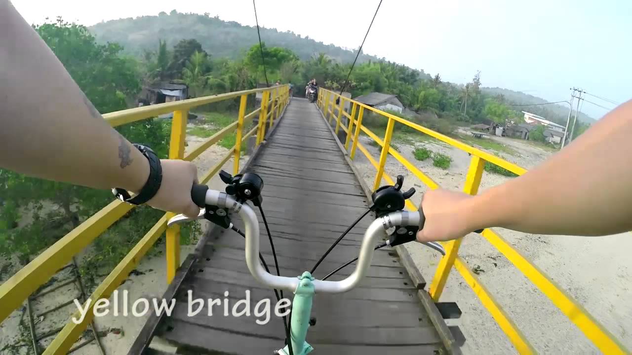 Experience the captivating visuals of a cycling journey around Nusa Lembongan.