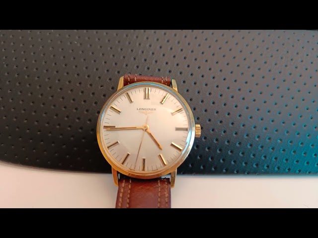887670 Longines gold watch 18K