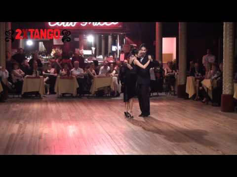  Jesica Arfenoni  and  Roberto Zuccarino  are  dancing  to  the  tango  "  Mandria  "