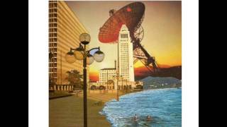 SLUG - Cockeyed Rabbit Wrapped in Plastic