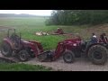 Loading A Broke Down Case IH Tractor With Another Broken CASE IH Tractor