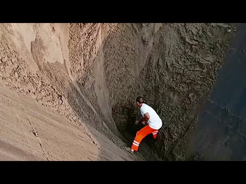 Barge unloading sand and river rock - my daily work on the barge