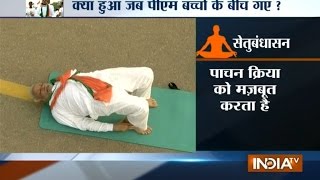 PM Modi performs Salabhasana and Setubandhasana at Rajpath on International Yoga Day
