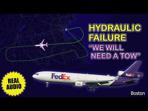 Hydraulic failure. FedEx MD-11 stops on the runway after landing at Boston Logan Airport. Real ATC