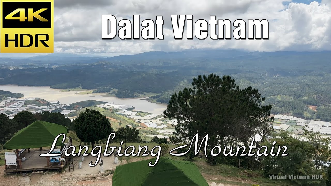 Embark on a cinematic hike up Lang Biang Mountain, marveling at forest trails, mist-shrouded vistas, and awe-inspiring panoramas from the peak.