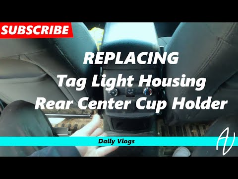 How To replace Rear Cup Holder and Tag Light Housing - 2013-2019 Ford Explorer (2016) - Daily Vlog