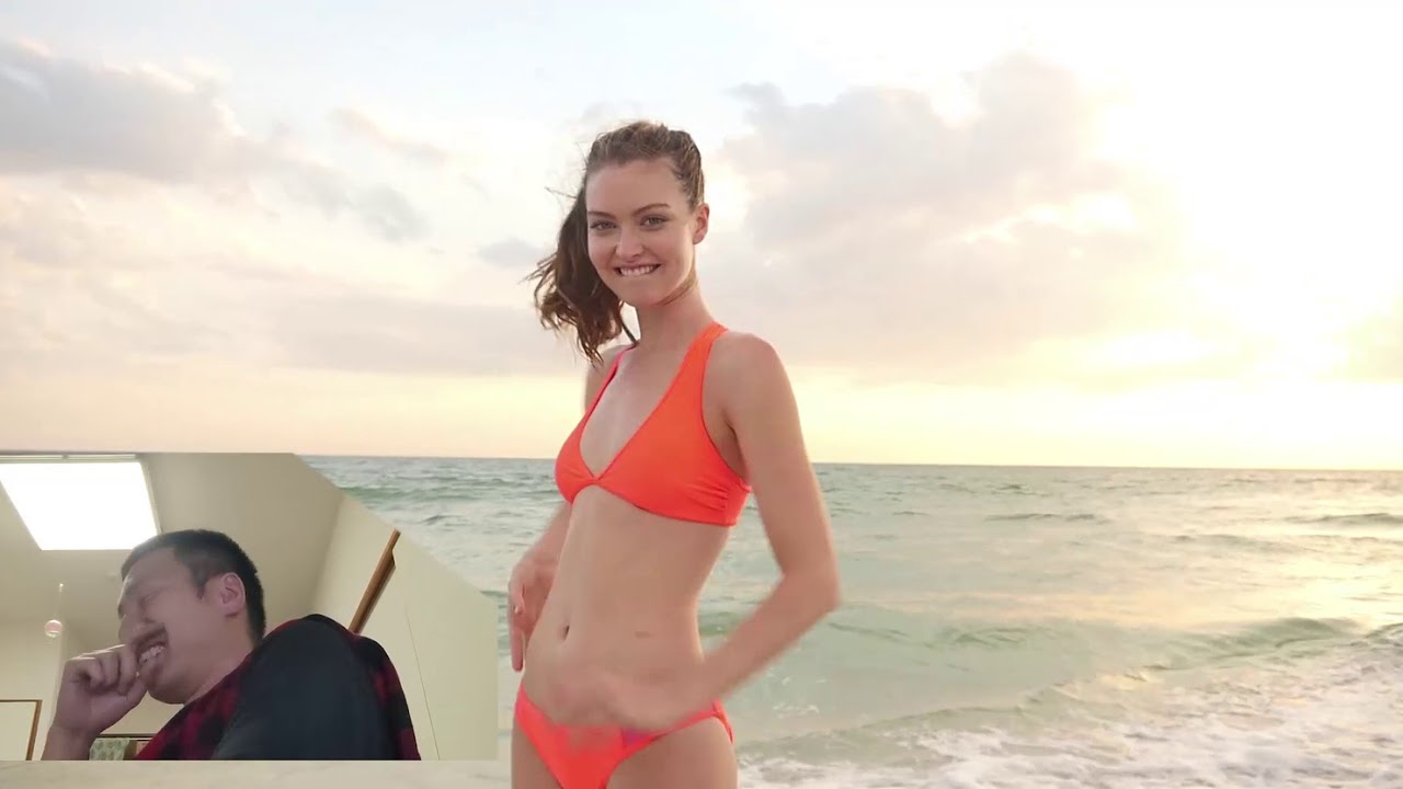 Sexy bikini girl and MEGWIN at the beach .