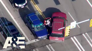 Man Carjacks MULTIPLE Vehicles While Running from the Police | Fugitives Caught on Tape | A&E