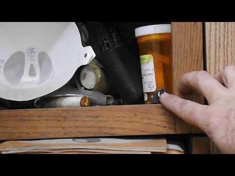 Everbilt Magnetic Touch Latch, Brown with strike plate.