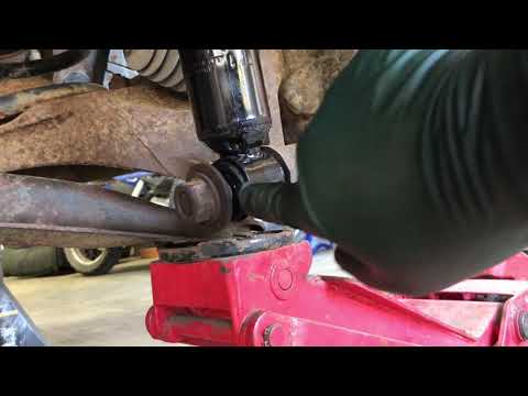 2005 Ford Escape:  Replacing the rear shock absorbers