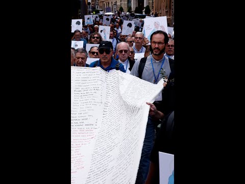 Catholic priests march against violence in Gaza