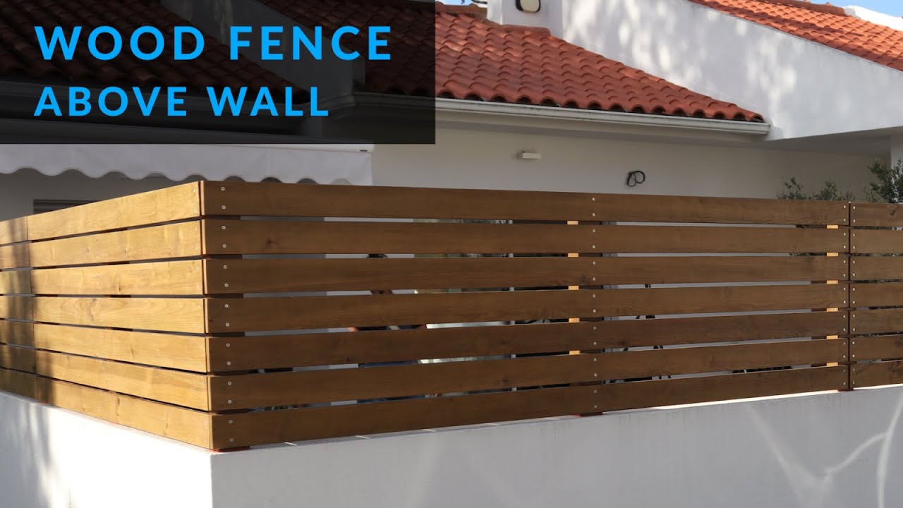 Watch video How to Install a Wood Fence Above a Wall Now How to Install a Wood Fence Above a Wall