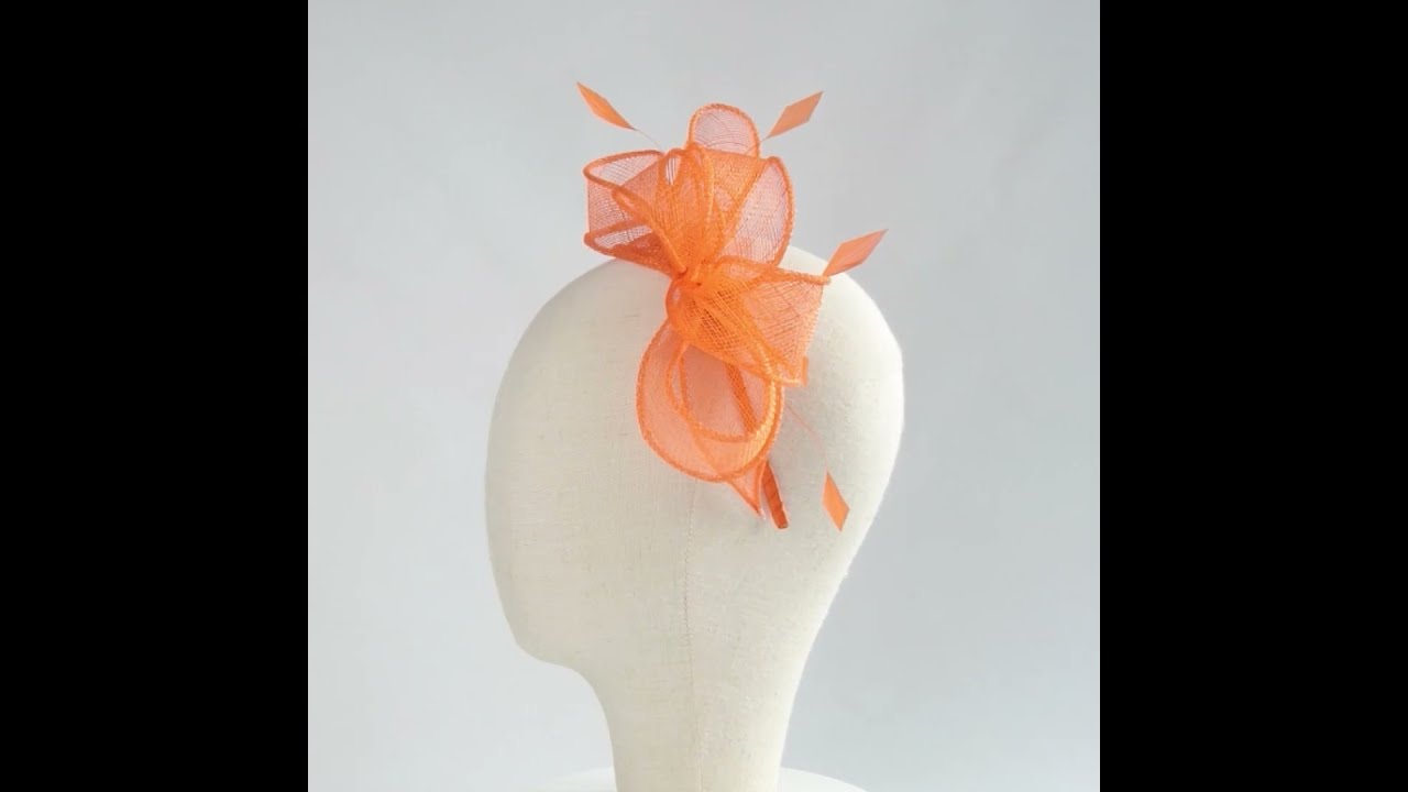 Watch video Orange Loop Fascinator with Coque Feathers Now Orange Loop Fascinator with Coque Feathers