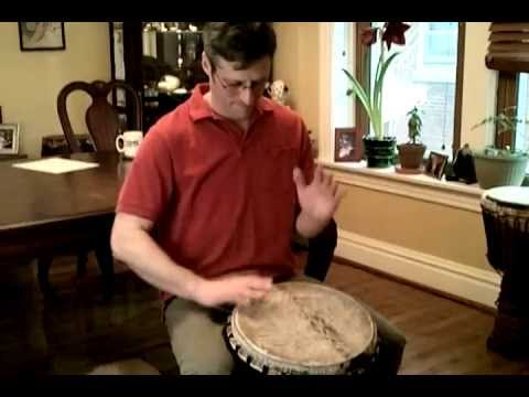 Adam Rugo plays djembe