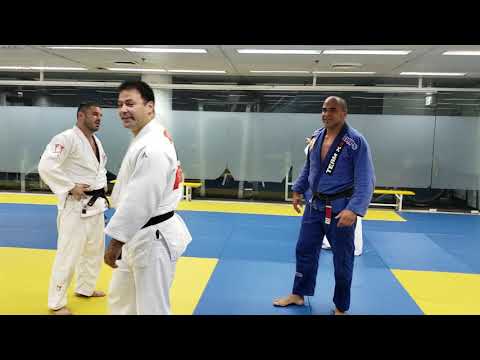 Rodrigo Artilheiro and Arik Zeevi doing techniques during judo practice