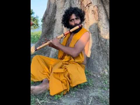 Mohit Chaudhary character of sadhu (playing flute)