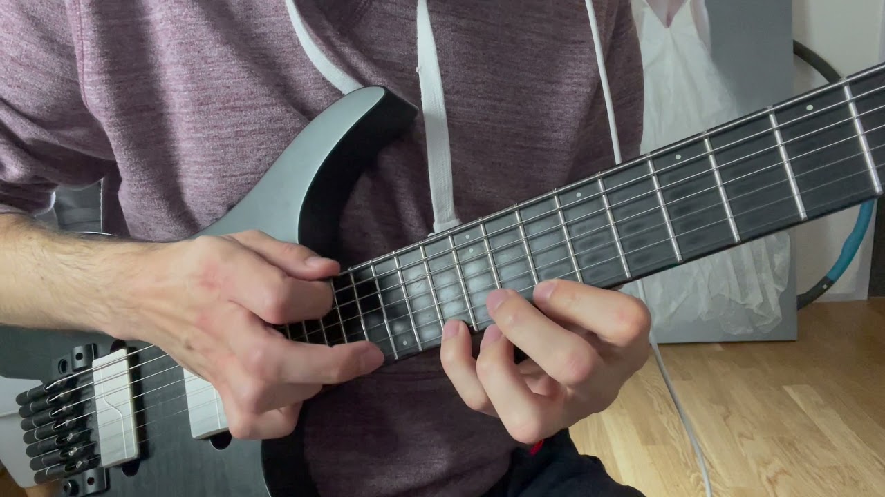Roberto Barlocci demonstrating a two-finger tapping lick on electric guitar