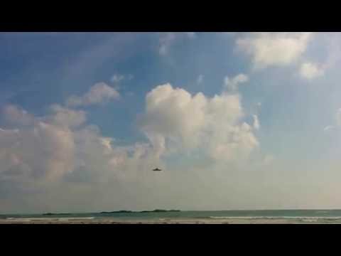 Hawk landing at RAF Valley over Rhosneigr beach - overhead