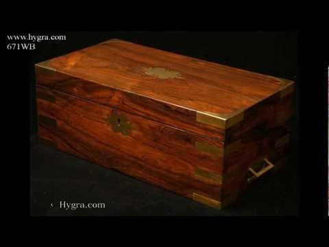 Antique Rosewood writing box with brass accents side drawer and secret drawers Circa 1830.