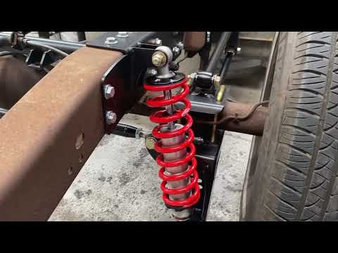 Chevy truck Ridetech bolt in 4link and coil overs fitted by American Technique
