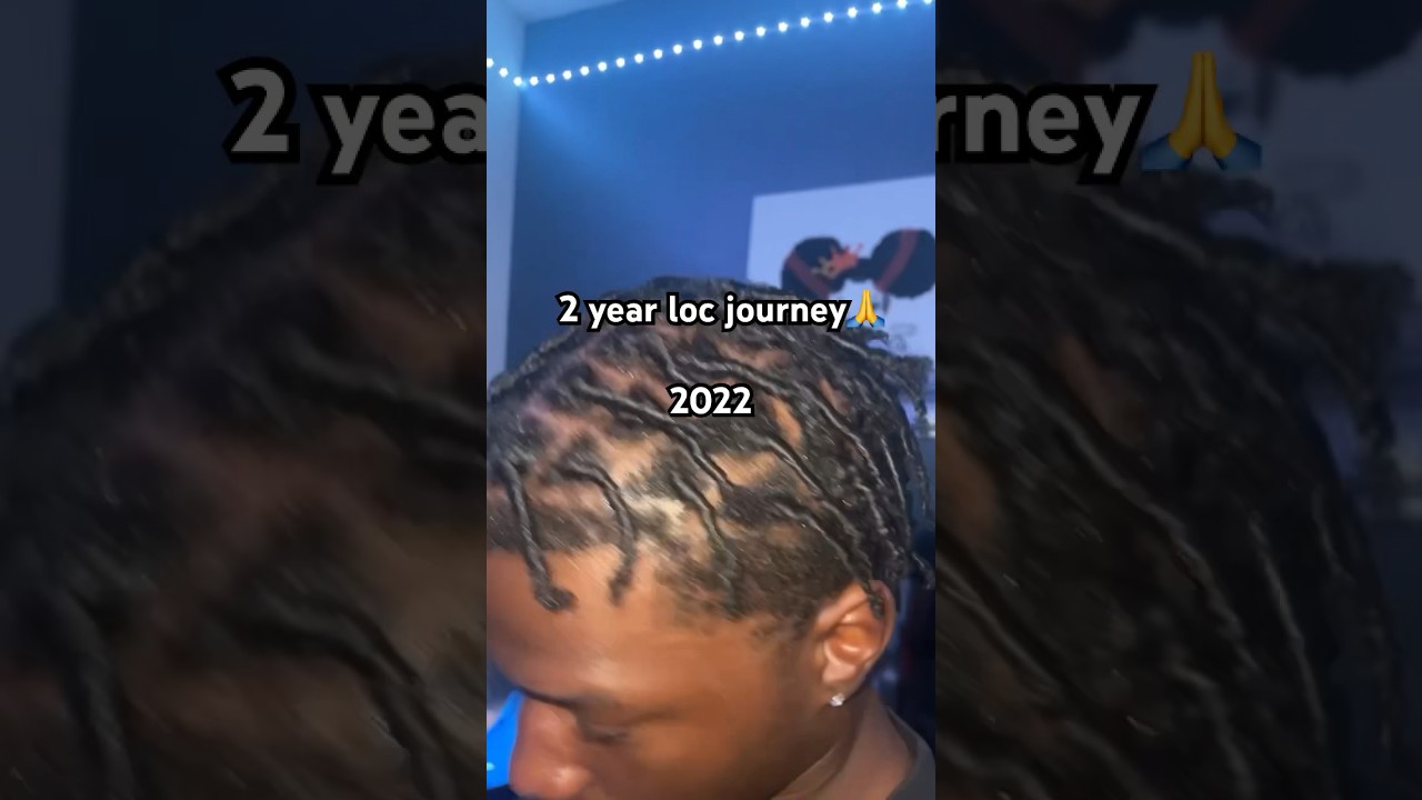 2 year loc journey 🙏 #roadto10k #locjourney #2strandtwist #locs #shortsfeed #freeformlocs