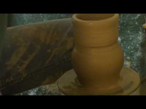 Throwing a long neck vase on the wheel 5x speed