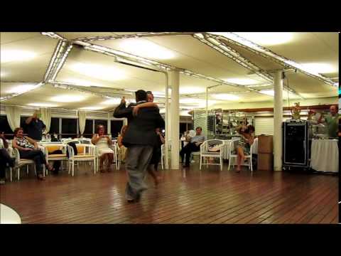  Alejandro Larenas  and  Marisol Morales  are  dancing  to  a  tango