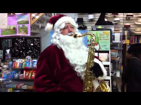Santa Claus plays the sax at Soave Faire in Saratoga