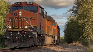 Amtrak 311 and BNSF 7068 passing Delta yard