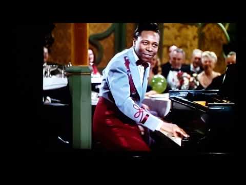 Maurice Rocco in movie "Incendiary Blonde".