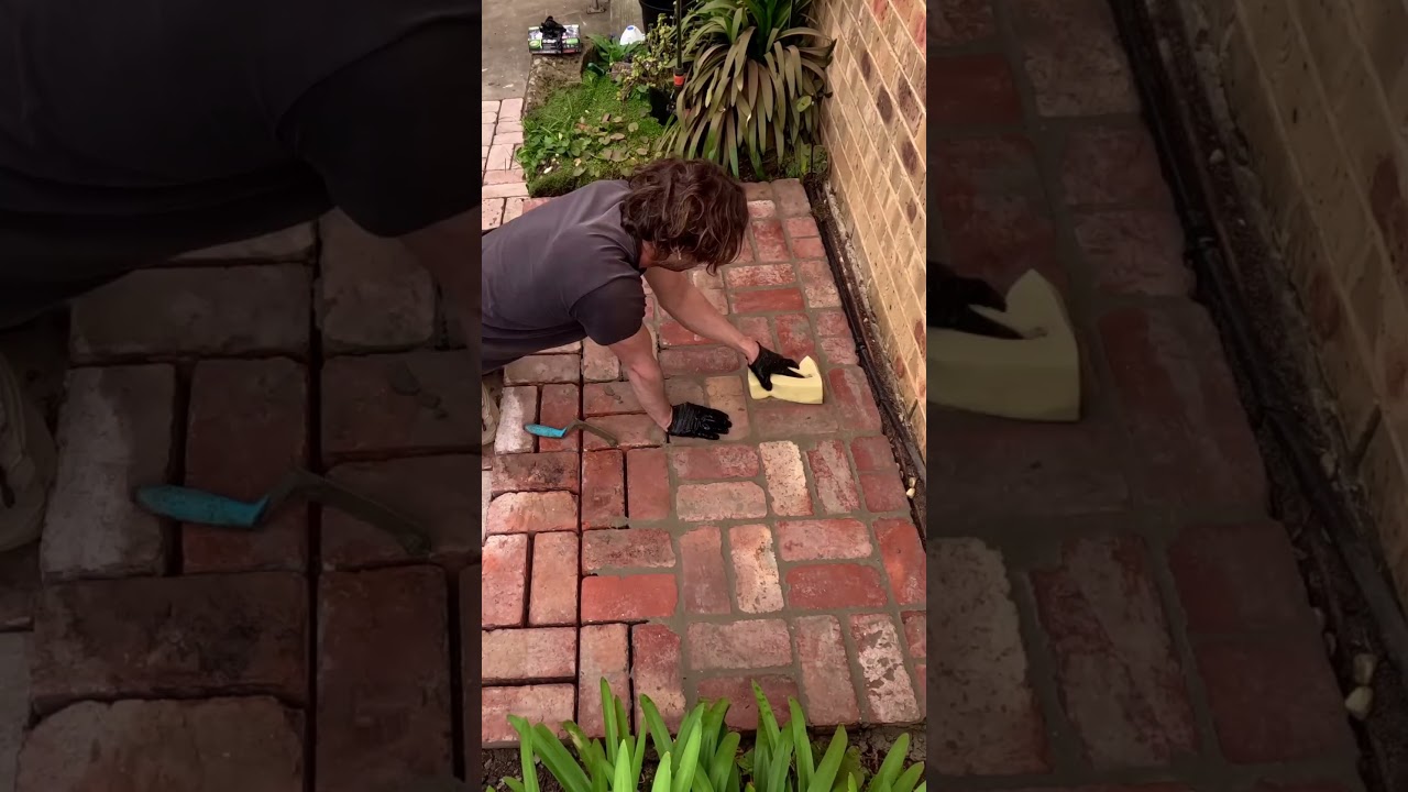 Grouting brick paving.  #landscaping #diy