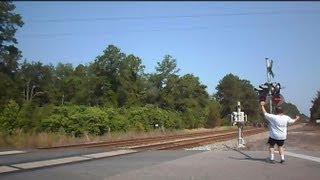 preview picture of video 'CSX Two Trains Man Gets Hit On Head With Gate'