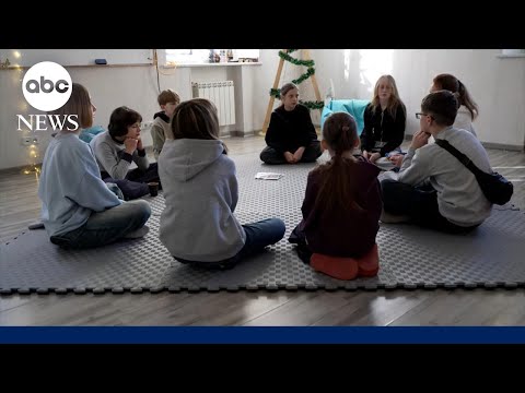 Returning Ukrainian children after being sent to Russian military camps