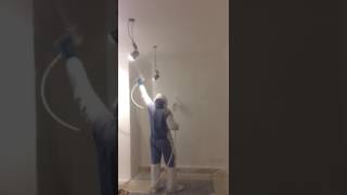 Spraying Lounge ceiling with Farrow & Ball All White Estate emulsion
