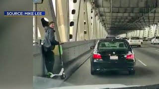 Scooter Riders on Bay Bridge Jam Traffic