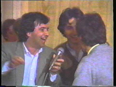 Bruno Giacomelli and Andrea de Cesaris singing 'Brasil' for Nelson Piquet