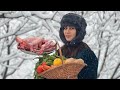 Cooking Tandoori Lamb With Saffron And Vegetables On A Snowy Winter Day