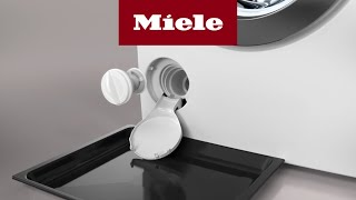 How do I replace the filter insert in my washing machine? | Miele