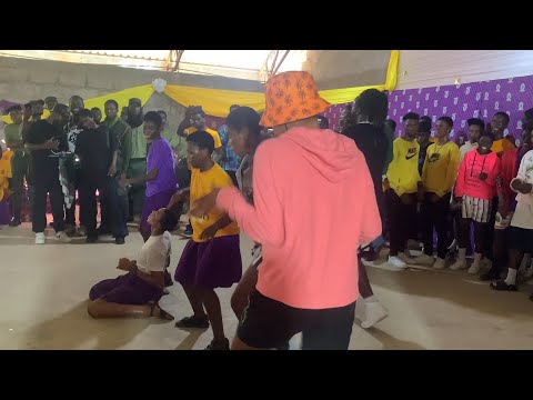 DJ Faculty shows dancing skills on stage during DopeNation performance.