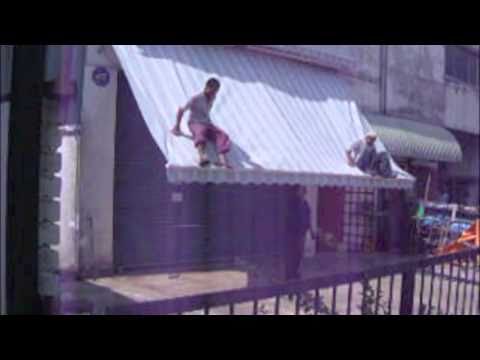 2 men walking-3m Francia Classic Awning yr 2004