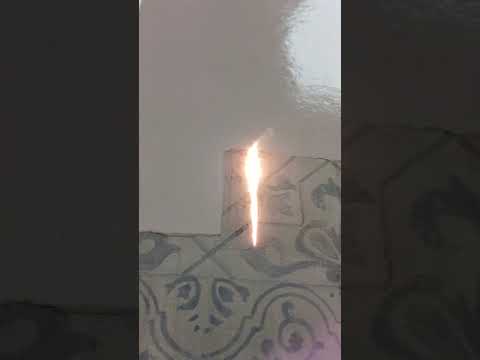 How to remove paint from tile with a laser?